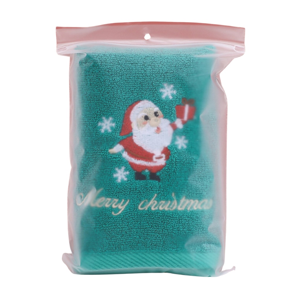 Green Christmas Baby Towel With Embroidered Santa Clause Design Packed In A Zip Lock Plastic Bag In A White Background 