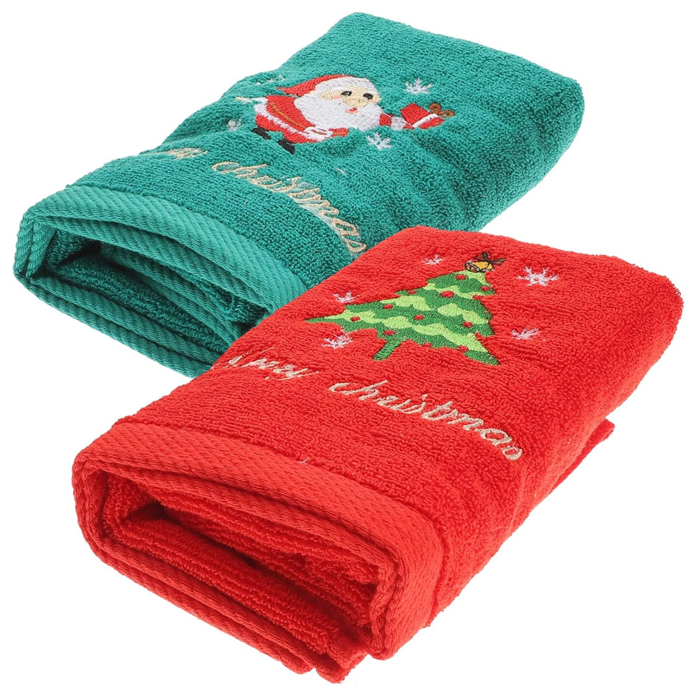 Two Red And Green Folded Christmas Baby Towel In A White Background