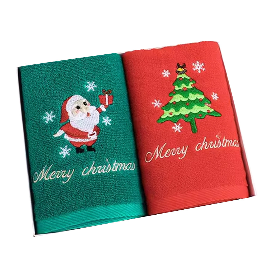 Two Red And Green Folded Christmas Baby Towel In A Open Box In A White Background