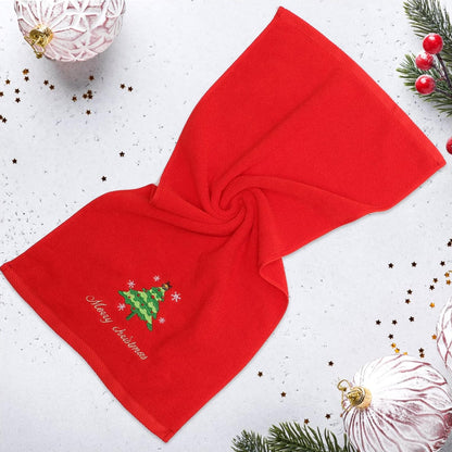 Red Christmas Baby Towel  With Embroidered Christmas Tree Design And Text Merry Christmas In A White Christmassy Background