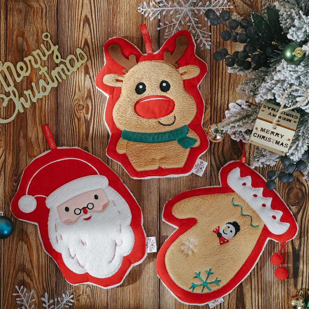 Three Christmas Themed Hanging Towel In a Wooden Background And Christmas Props