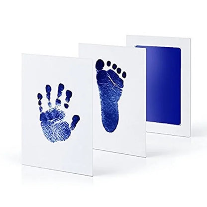 Three canvas panels displaying blue handprint, footprint, and solid blue color.