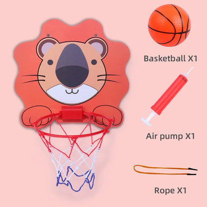 A cartoonish lion basketball hoop with a ball, pump, and rope on a pink background.