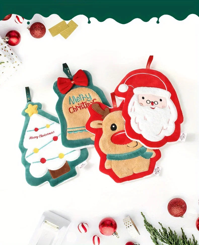 Four Christmas Themed Hanging Towel In A White Background And Christmas Props