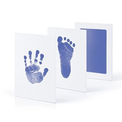 Three canvas panels featuring a child's blue handprint, footprint, and a solid blue color.