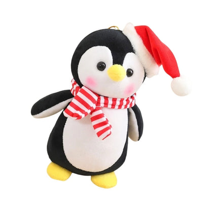 Penguin With Red and White Striped Scarf And Red Hat Plush Stuffed Toy In A White Background