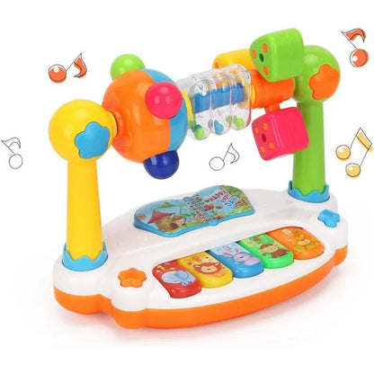 Colorful baby musical toy with buttons, book page, and hammering balls on a white background